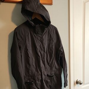 The North Face Black Raincoat with Hood and Weather-Resistant Fabric
